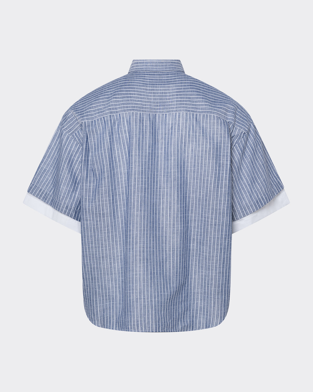 Back view of the blue striped layered-sleeve button-down shirt.