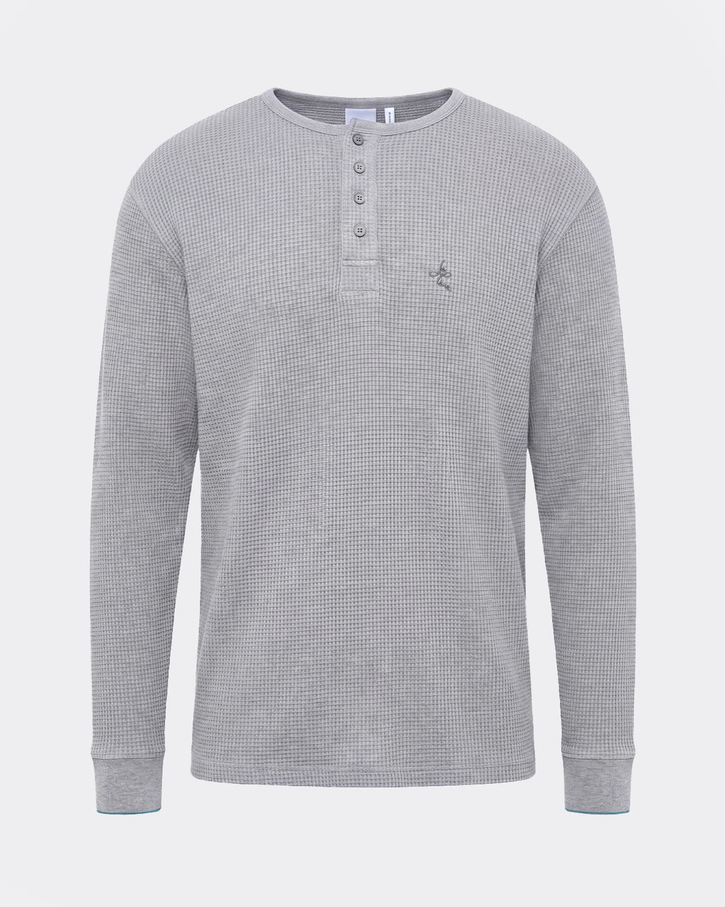 Woven from 100% premium Portuguese cotton, the Long Sleeve Henley is reimagined for FW26 in a grey melange waffle knit.
