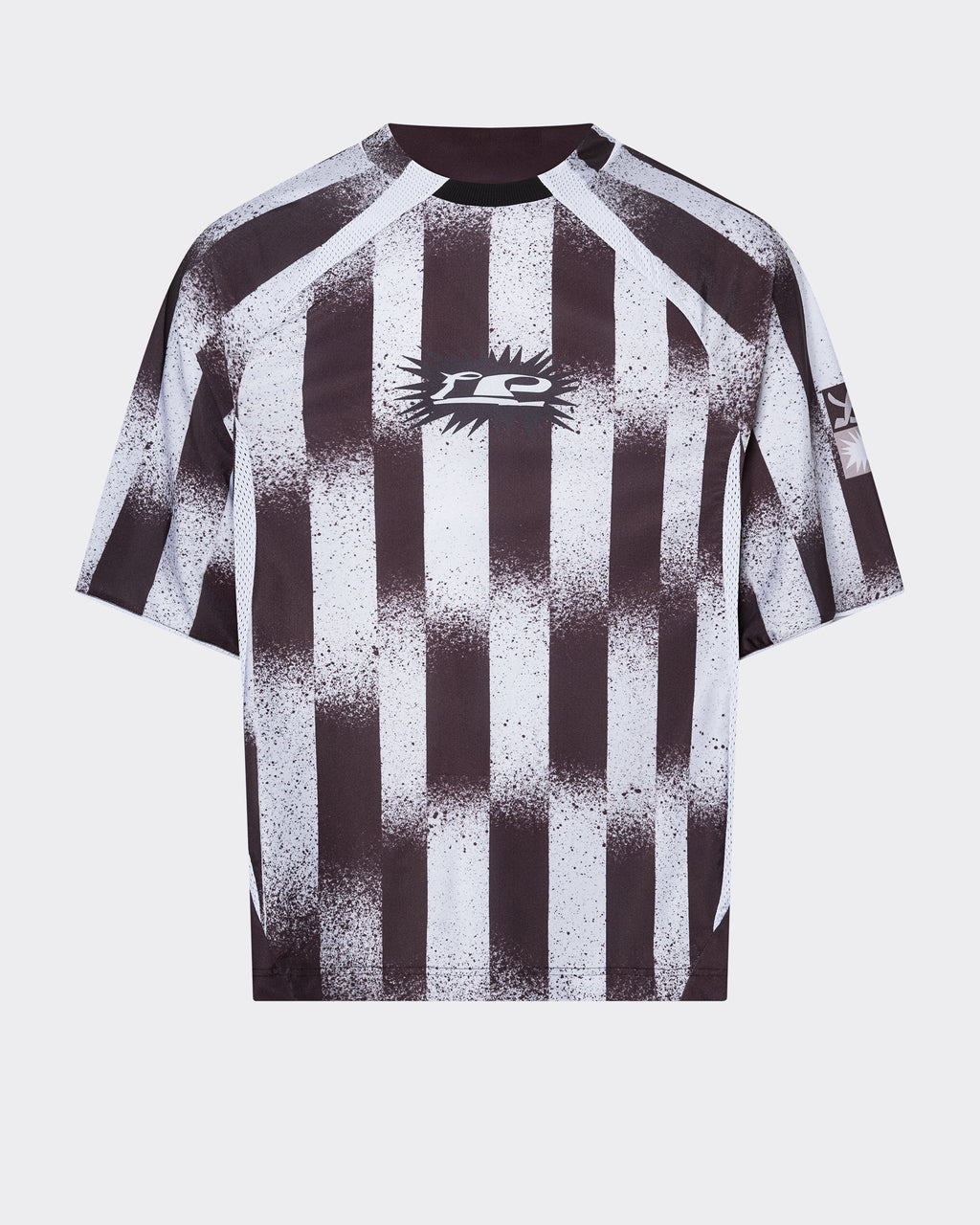 A black and white striped football jersey with a 'le PÈRE' crest badge on the chest and sleeve, featuring a bold, torn-paper style stripe pattern.