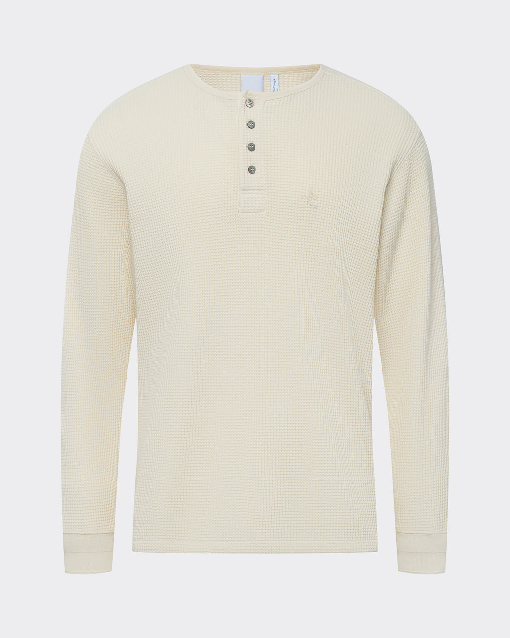 Woven from 100% premium Portuguese cotton, the Long Sleeve Henley reimagines a utilitarian classic in an ecru waffle knit.